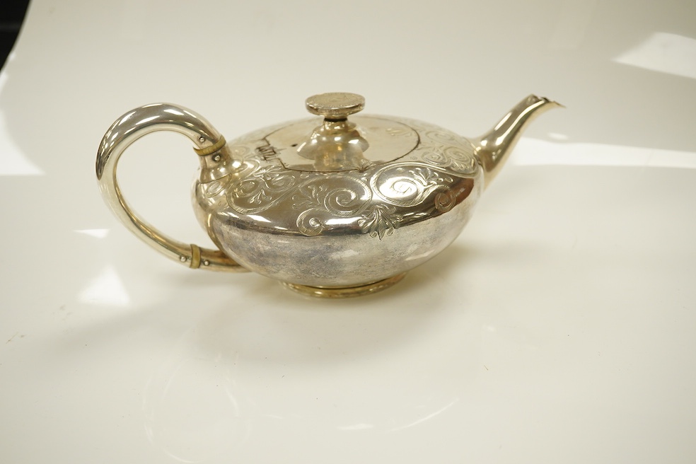 A Victorian silver bachelor's squat circular teapot, indistinct maker's mark, London, 1845, gross weight 13.8oz. CITES Submission reference XJ224VHB. Condition - fair